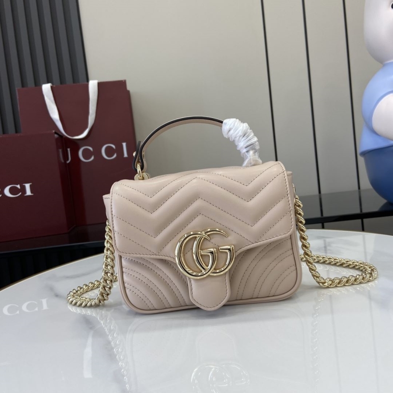 G*u*i top handle bags